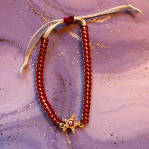 Handmade nylon satin adjustable bracelet with evil eye charm